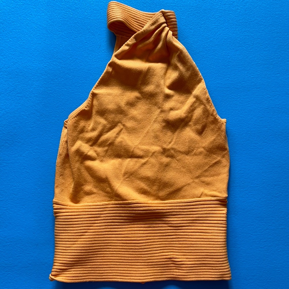 Cache top. Only wore it couple of times .